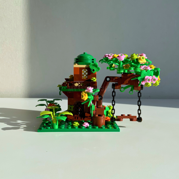 Toy brick treehouse Mosque set on a plain background